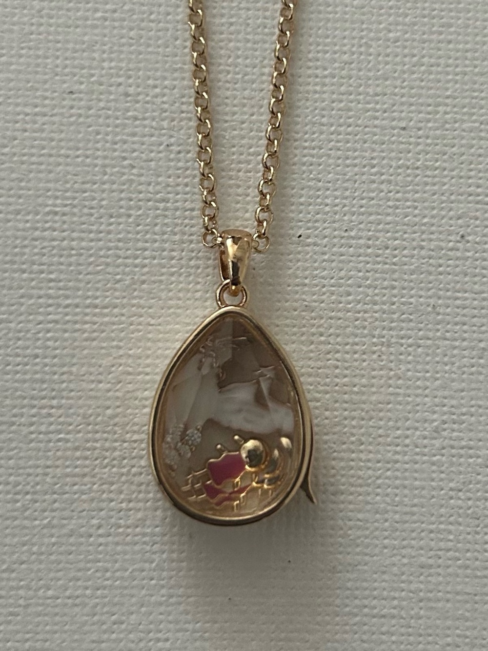 Locket Necklace with
Two charms: Girl and Dove of Peace